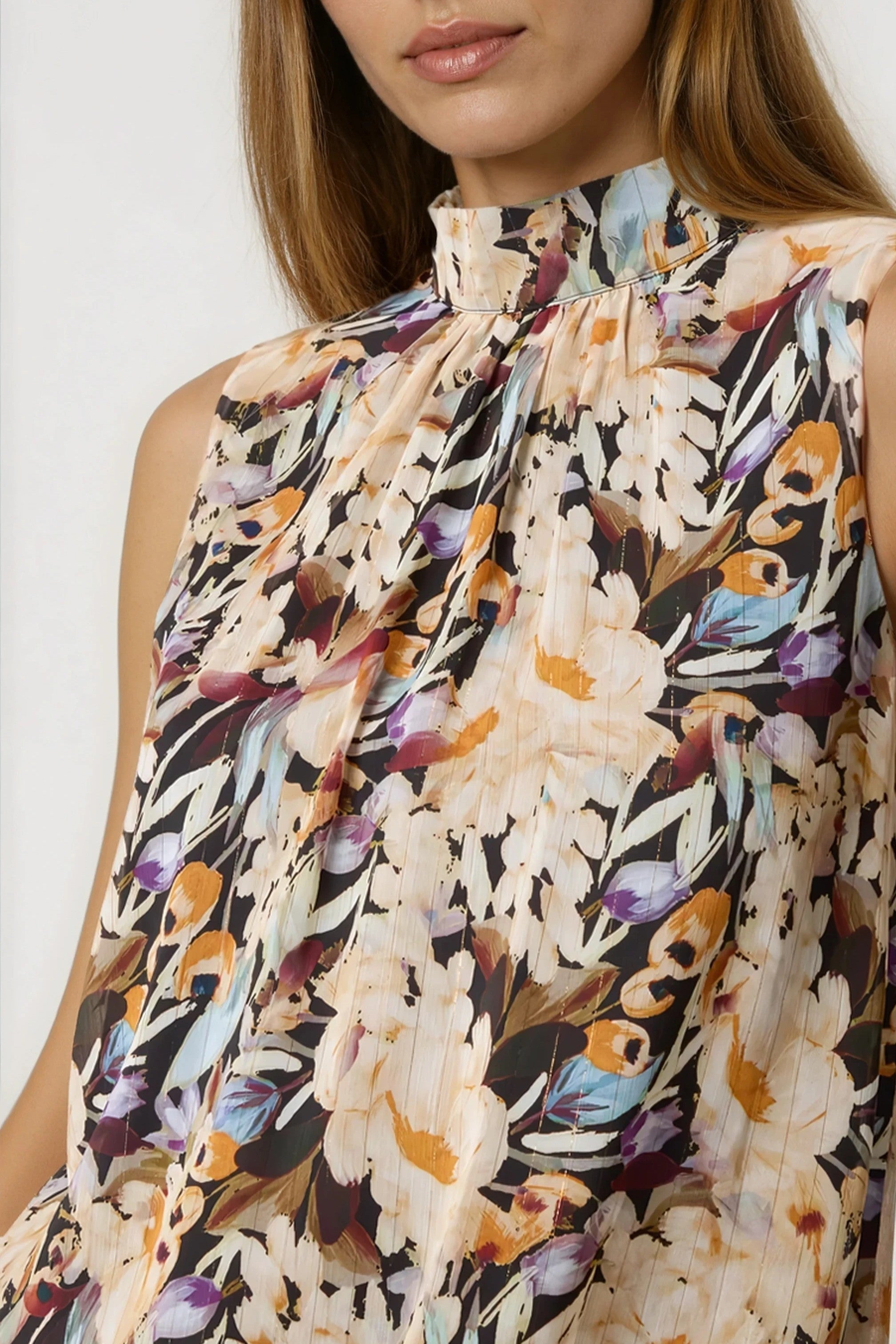 Floral Print Sleeveless High Neck Puff Hem Blouse